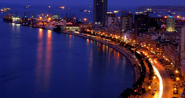 Waterfront city skyline at night
